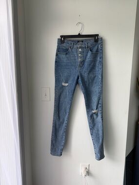 Express High-Rise Button-Fly Distressed Jeans in Medium Blue